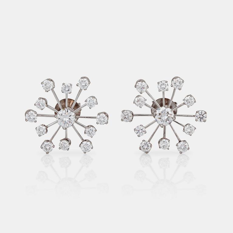 A pair of brilliant-cut diamond earrings. Total carat weight circa 2.90 cts.