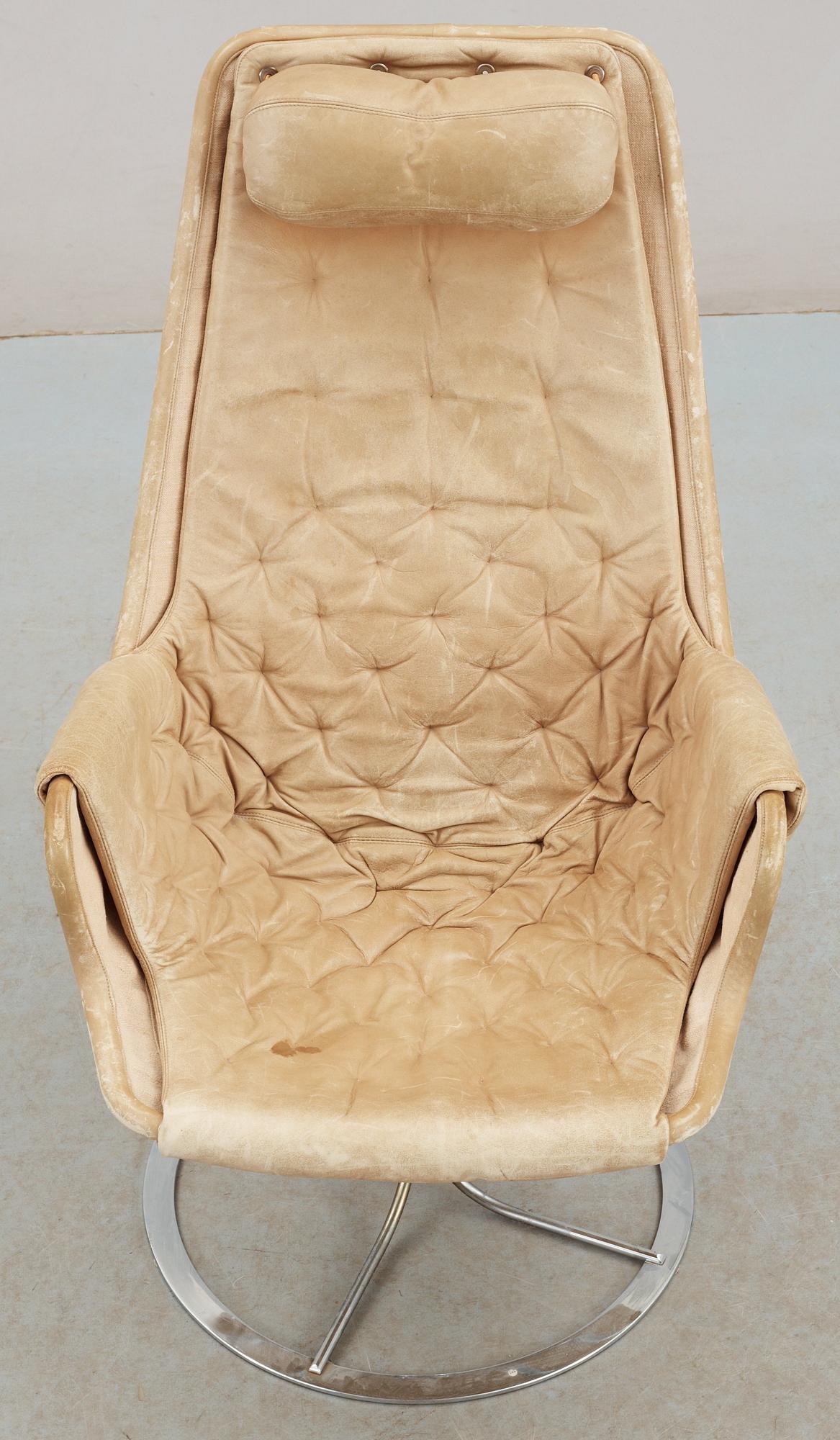 A Bruno Mathsson beige leather and chromed steel 'Jetson' easy chair, DUX.