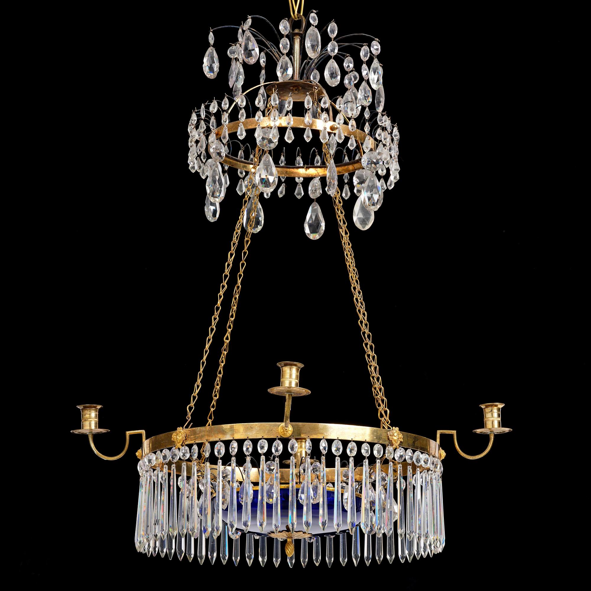 A late Gustavian five-light gilt brass and cut glass chandelier, Stockholm, late 18th century.