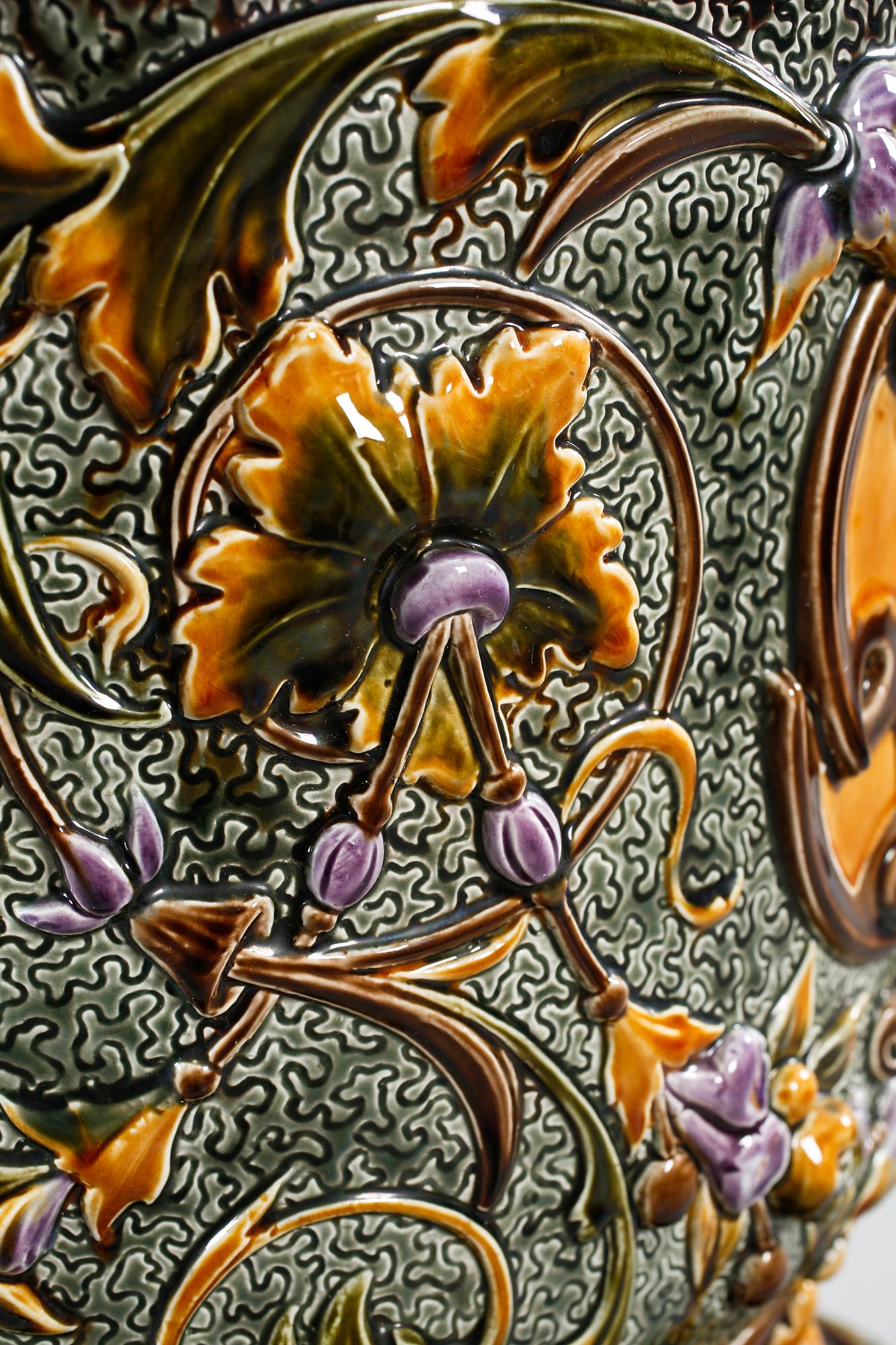 A pot on a pedestal in ceramics made by Rörstrand in the years between 1884-1890.