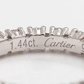 Cartier, a platinum and brilliant-cut diamond eternity ring.