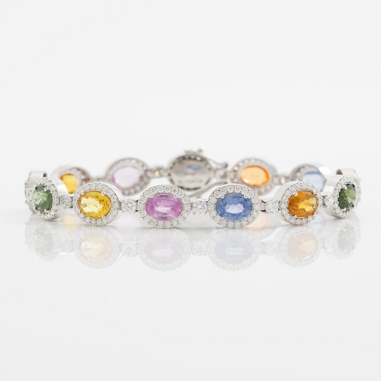 Bracelet 18K white gold set with oval-cut multicoloured sapphires and brilliant-cut diamonds.