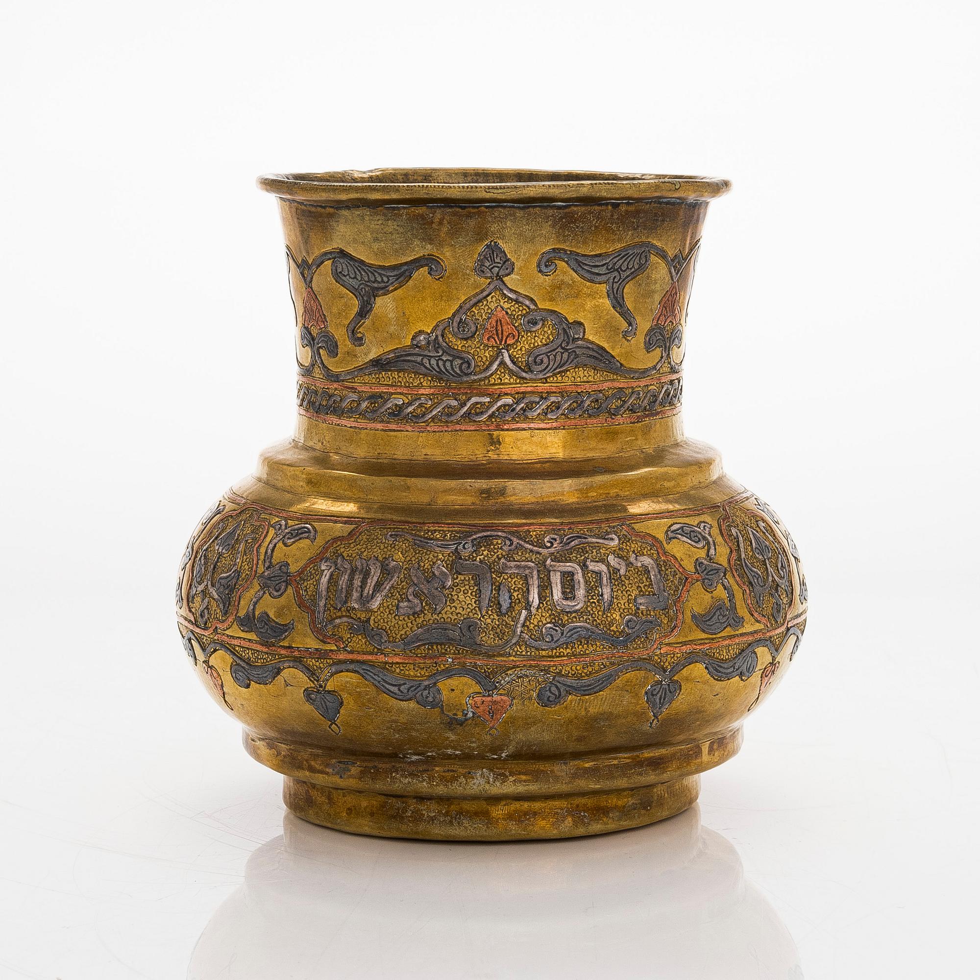 A Judaica vase in brass, copper and silver. Cairo ware with hebrew text. Egypt/Syria, turn of the 19th/20th century.