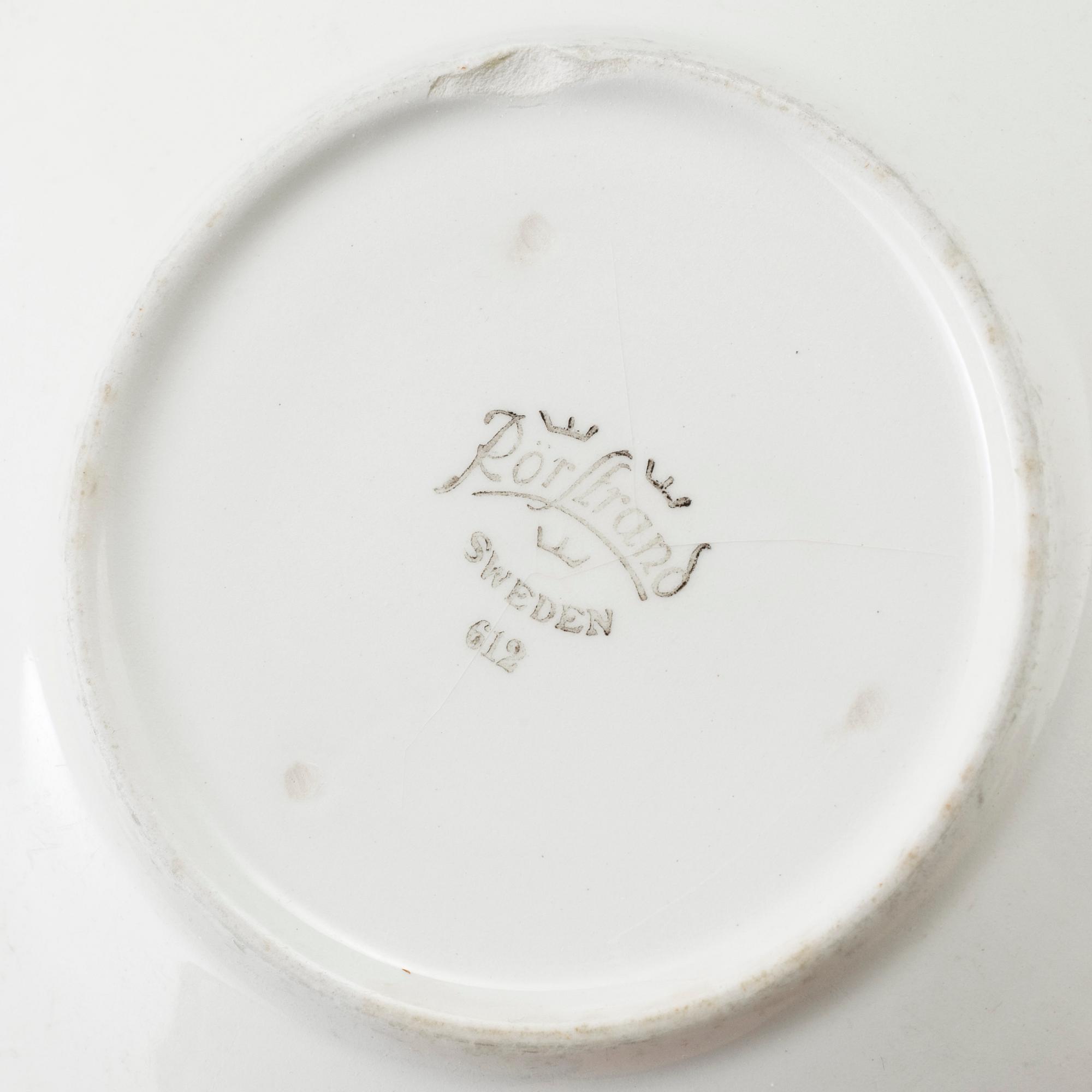 A Swedish Rörstrand 'Blå Eld' part dinner service. Design by Herta Bengtsson. (41 pieces).