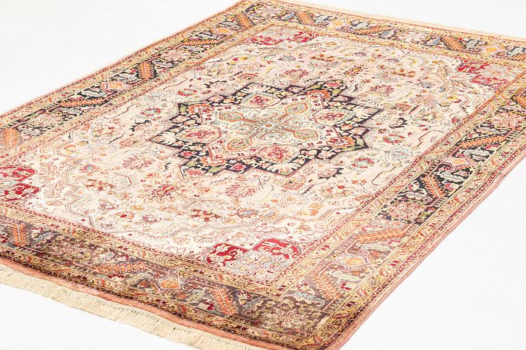 A rug, old, silk Tabriz, signed, ca 201 x 140 cm.