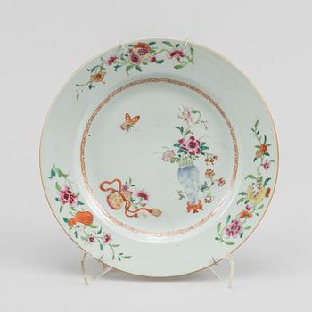 A famille rose dish and two dinner plates, Qing dynasty, Qianlong (1736-95).