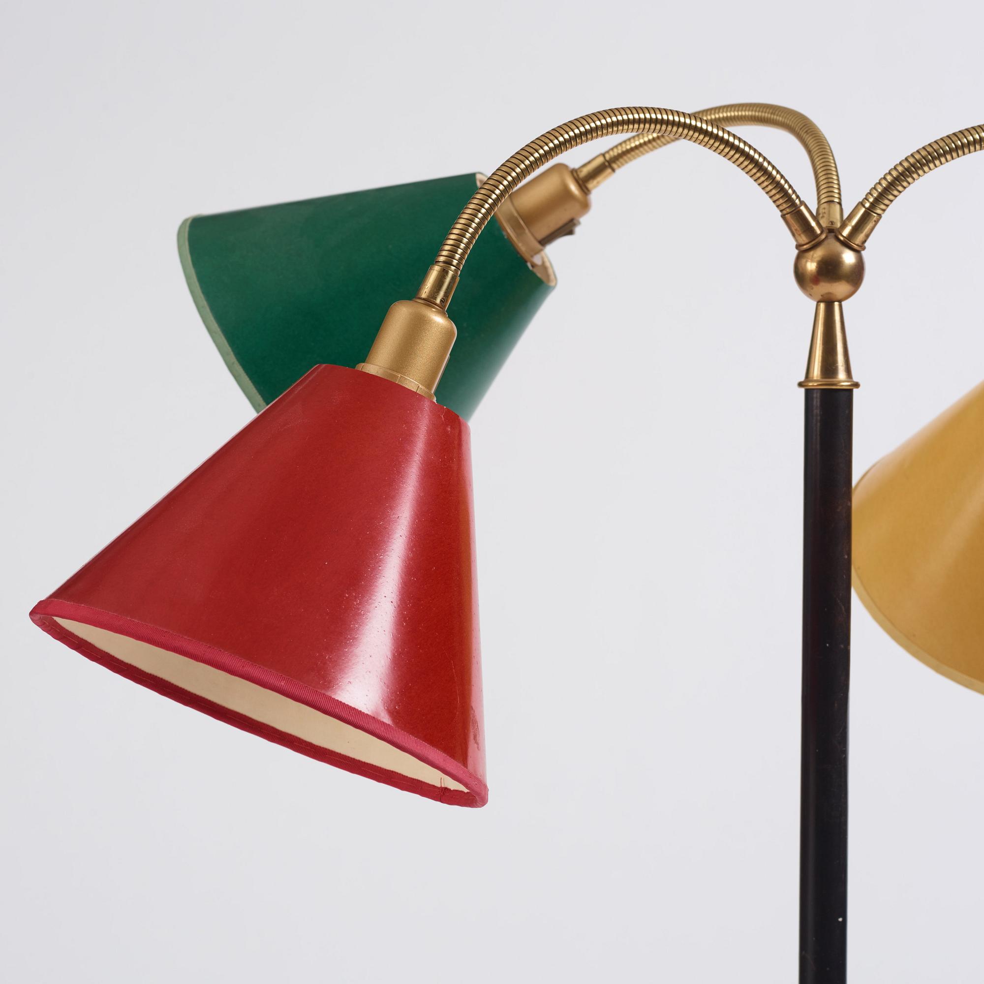 Josef Frank, a brass and black lacquered floor lamp model "2431", Firma Svenskt Tenn, Sweden.