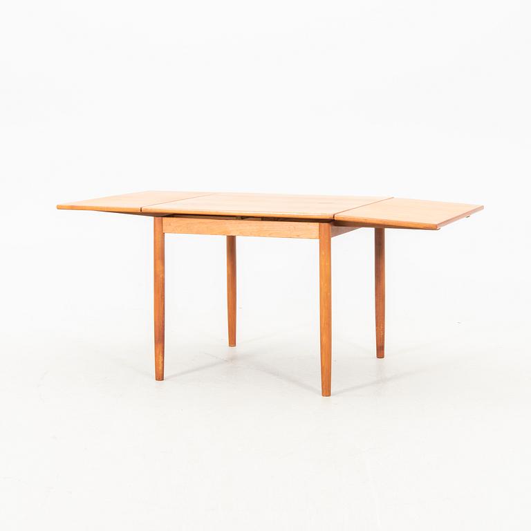 A teak table from the middle of the 20th century.