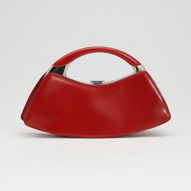 CHRISTIAN DIOR, a red leather evening bag / clutch, "Frame Sac Fermoir".