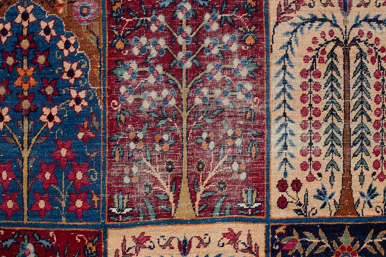 A carpet, an antique/a semi-antique Yezd, ca 557-562 x 366,5-370,5 cm.