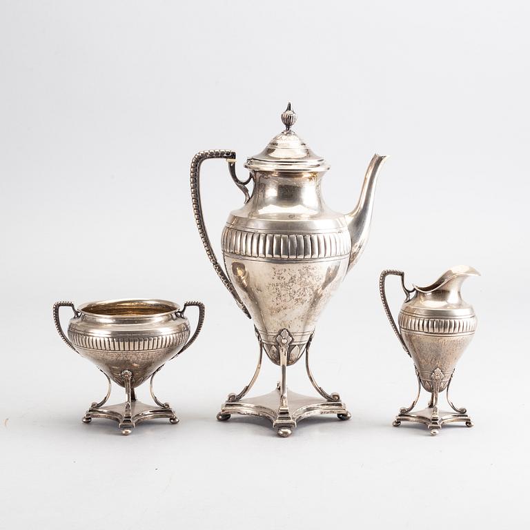 A Swedish 20th century silver three part coffee service mark of GAB Stockholm 1902 weight 1100 gr.