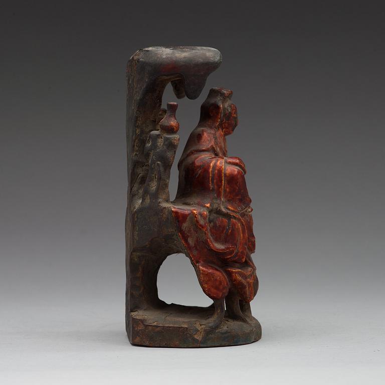 A lacquered wooden figure of Guanyin, Ming dynasty (1368-1644).
