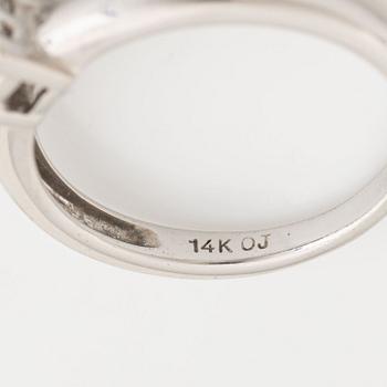 Four princess cut diamond ring.