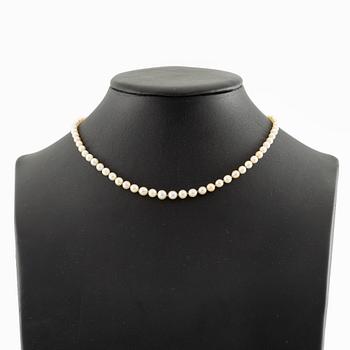 Pärlcollier lås 18K guld med en gammalslipad diamant och rosa stenar.