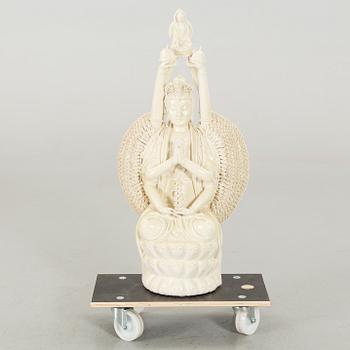 A porcelain figurin, late 20th century,