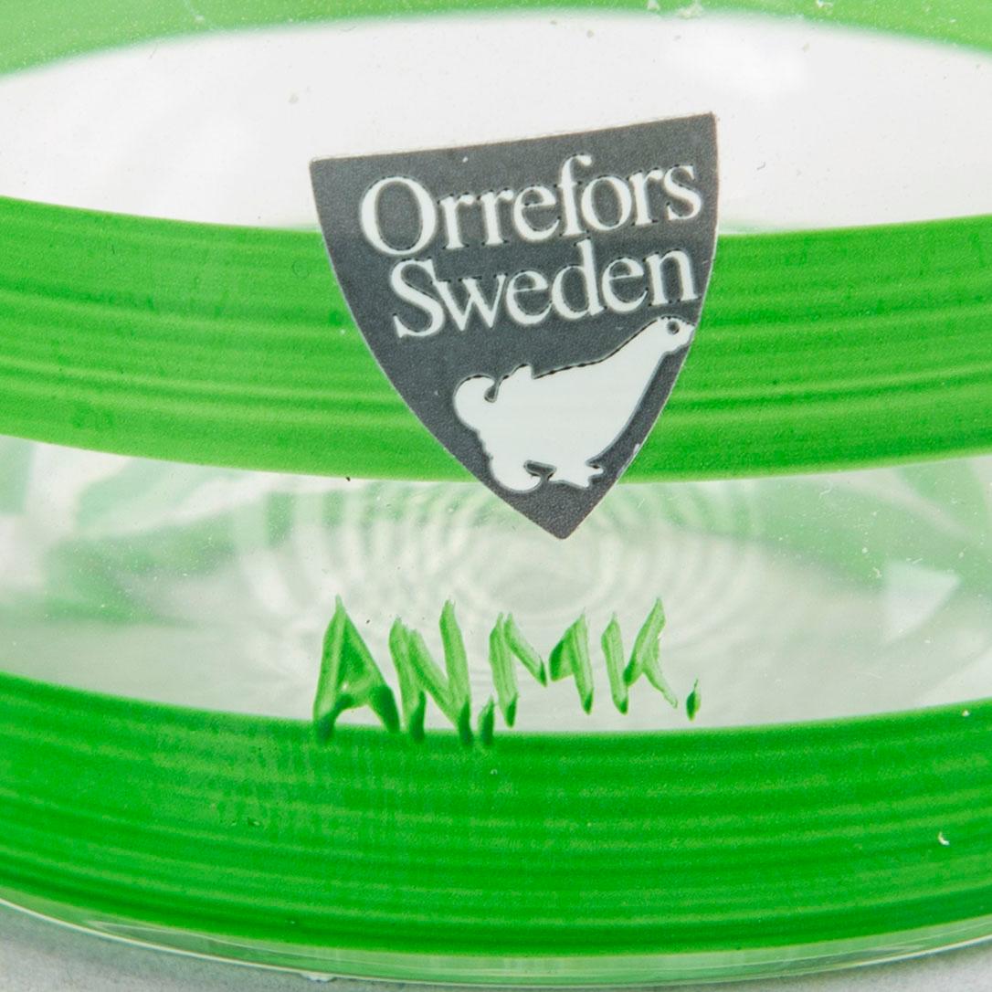 A signed handpainted glass decanter by Anne Nilsson later part of the 20th century.