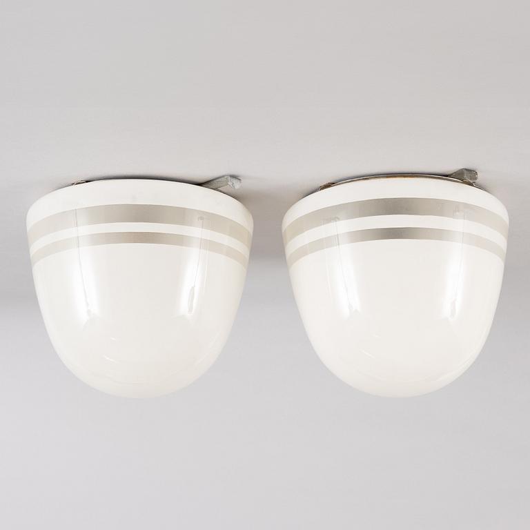 Harald Notini,  a pair of ceiling lamps, version of model "10148", Arvid Böhlmark's Lamp Factory, 1930s.