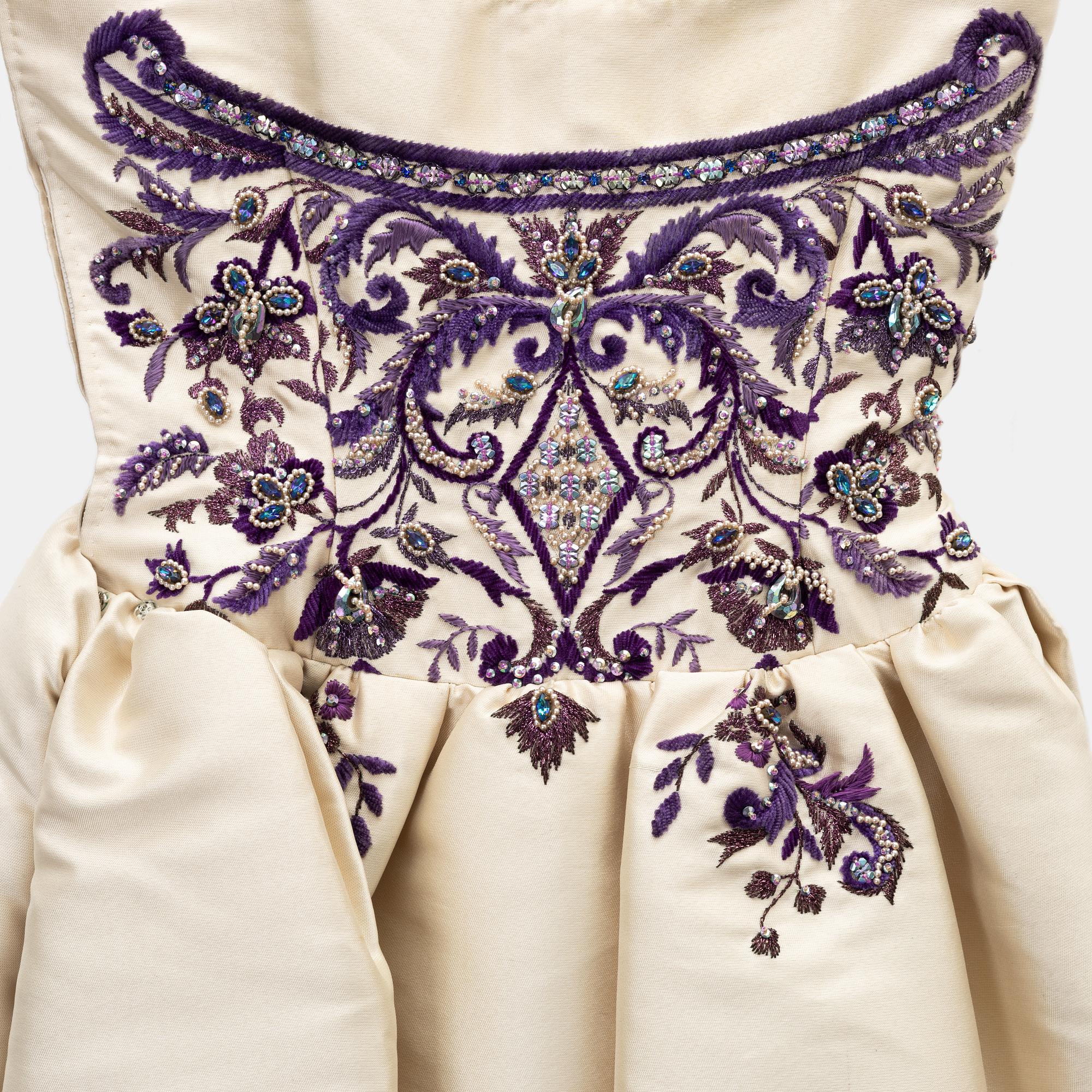 Jeanne Lanvin, A 1950's Antonio del Castillo pearl embroidered dress.