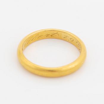 23K gold ring.