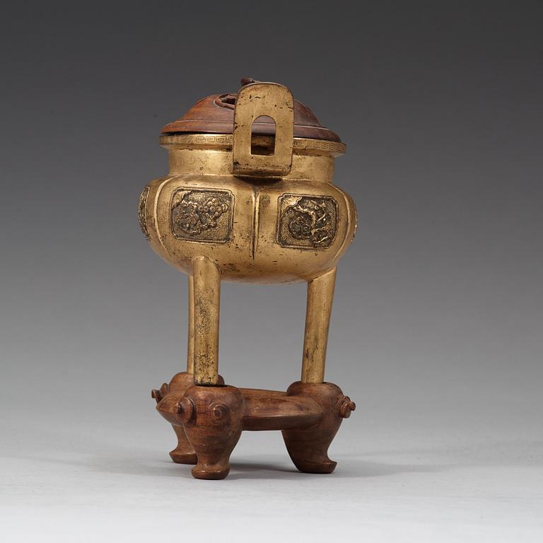 A bronze tripod censer, Qing dynasty, 19th Century.