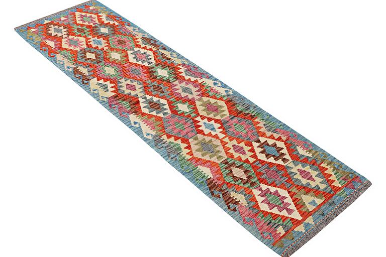 A runner carpet, Kilim, c. 292 x 82 cm.