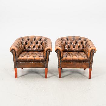 A pair of leather armchairs. second half of the 20th century.