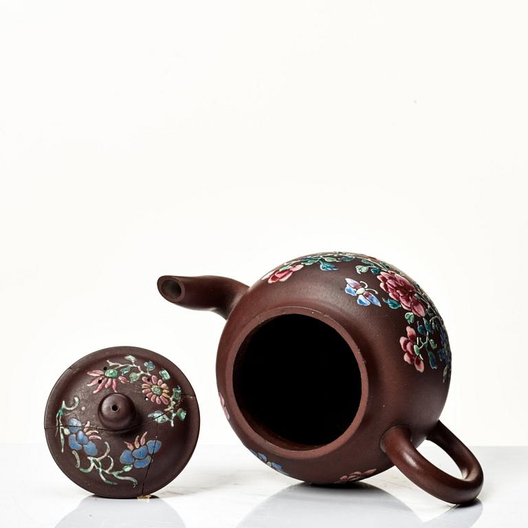 A yixing ware tea pot with cover, Qing dynasty, 18th Century.