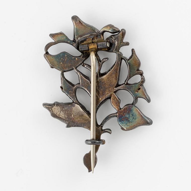 Brooch in silver set with rose-cut diamonds, 19th century.
