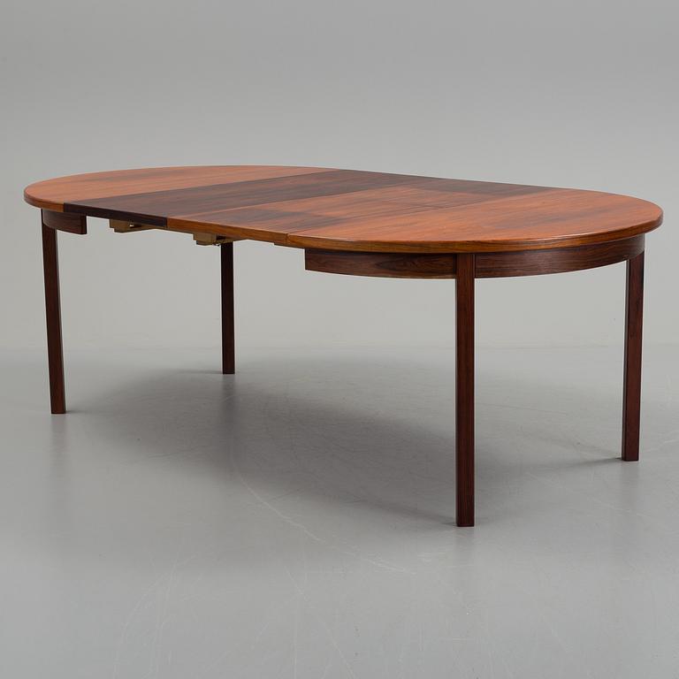 A dining table and four chairs by Nils Jonsson, Troeds Bjärnum.