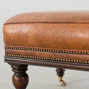 A CHESTERFIELD STYLE OTTOMAN, around year 2000.