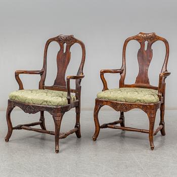 A pair of Swedish Rococo armchairs, second half of the 18th century.