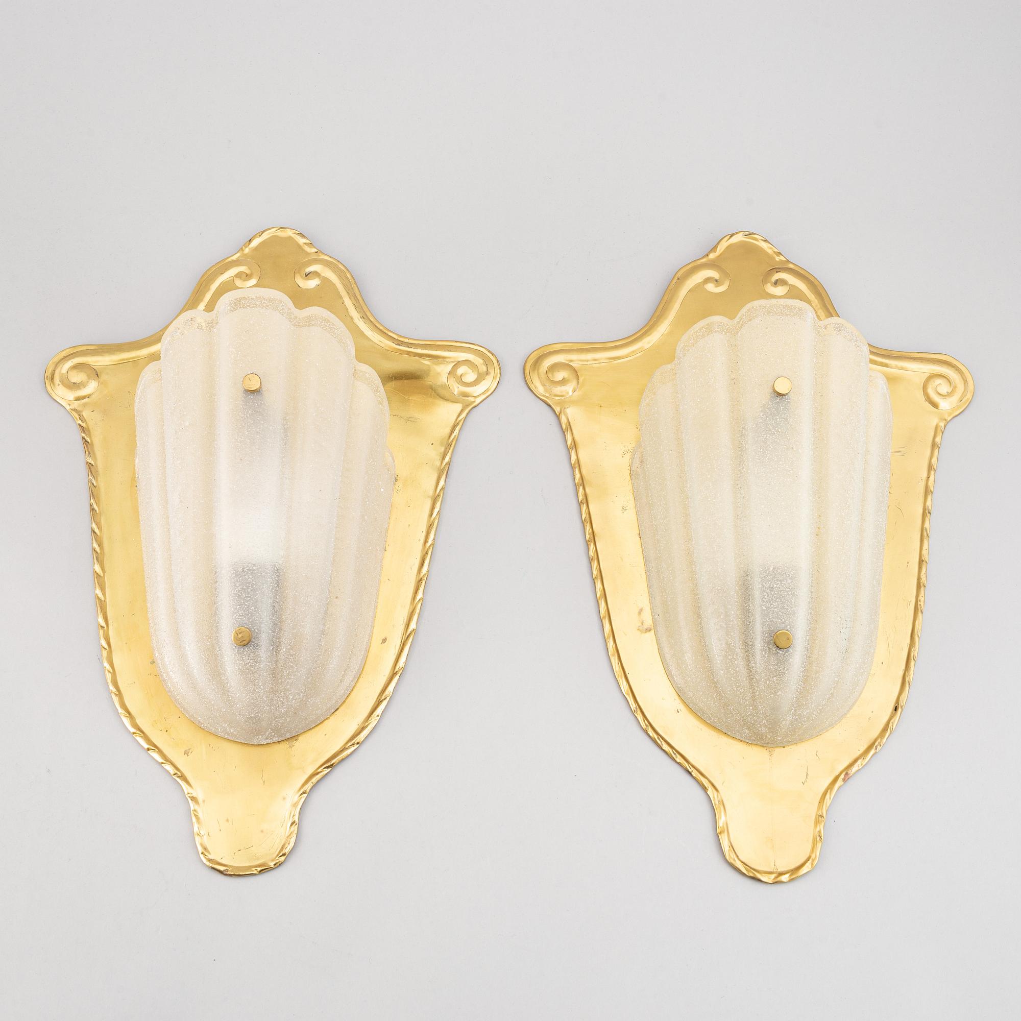 A pair of brass and glass wall lamps, 1940s.