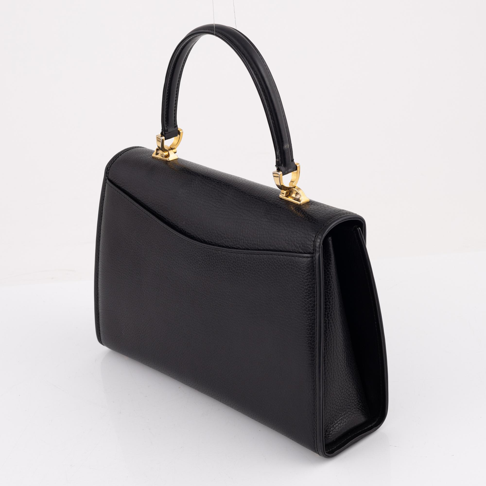 Bally, a black leather bag.
