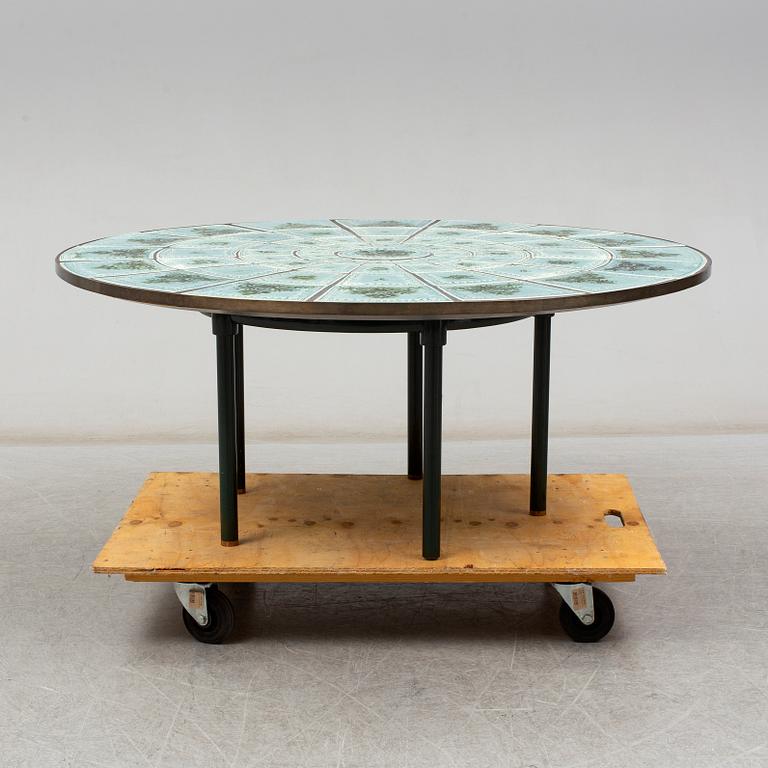 BJÖRN WIINBLAD, a ceramic and metal table, signed.