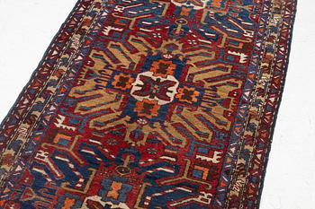 A runner carpet, North Western Iran, c. 317 x 107 cm.