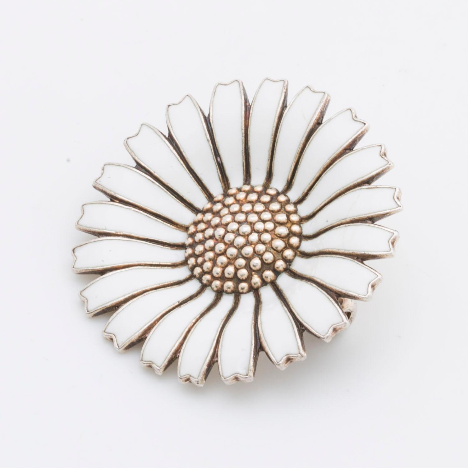 GEORG JENSEN,BROOCH, "Daisy", sterling silver and enamel, length approx 3 cm.