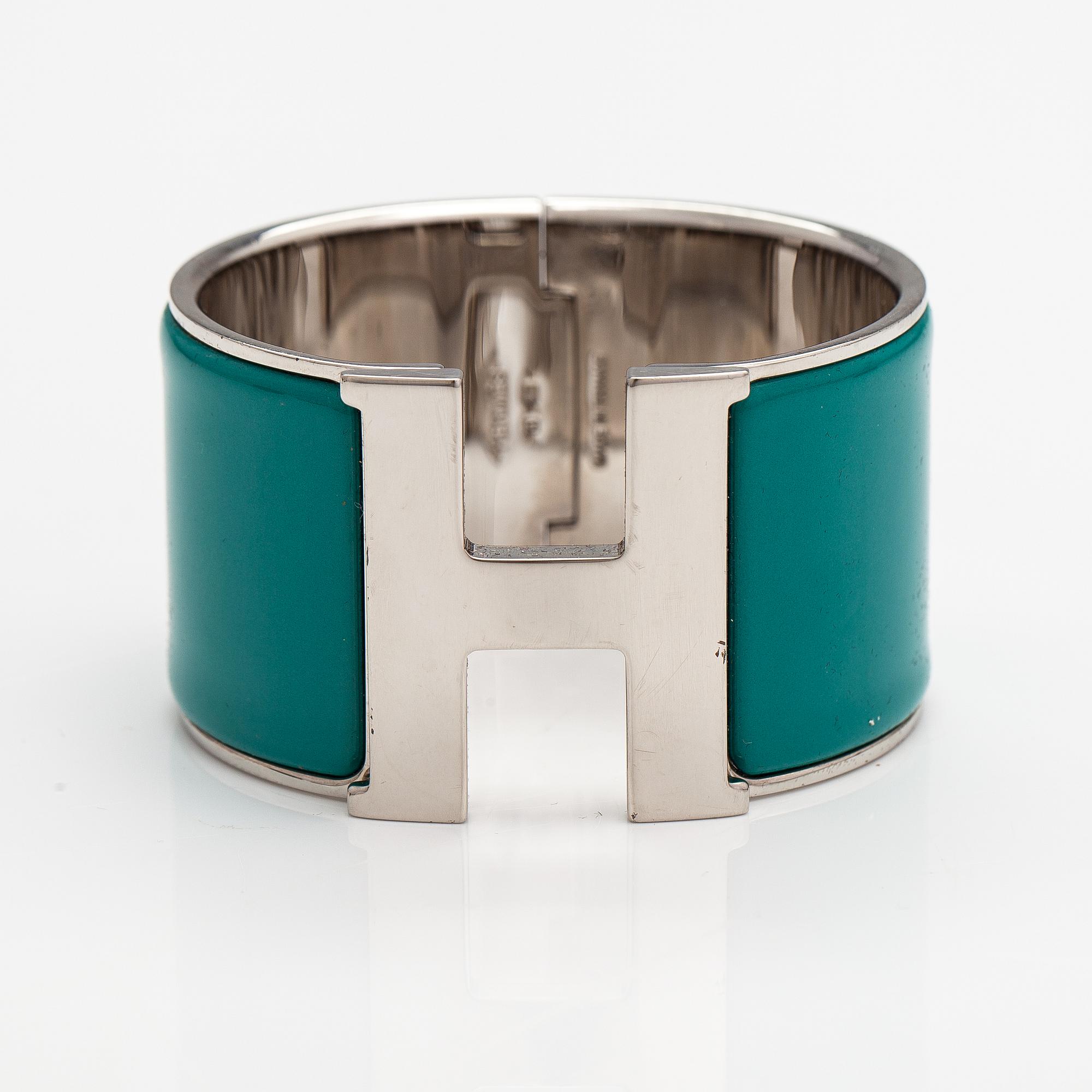 Hermès, A "H click" bracelet made of metal and enamel. Marked Hermès, S, Made in France.