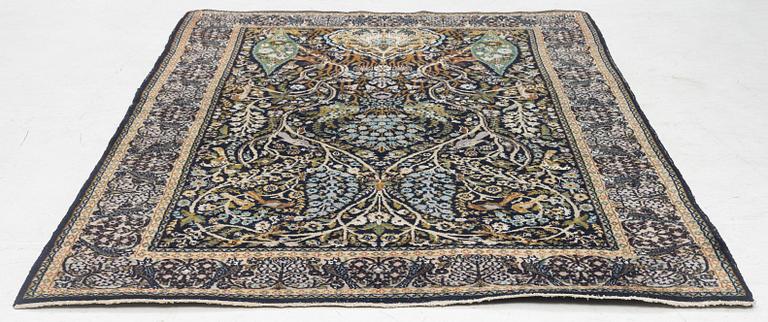 A figural Quum carpet, c. 179 x 125 cm.