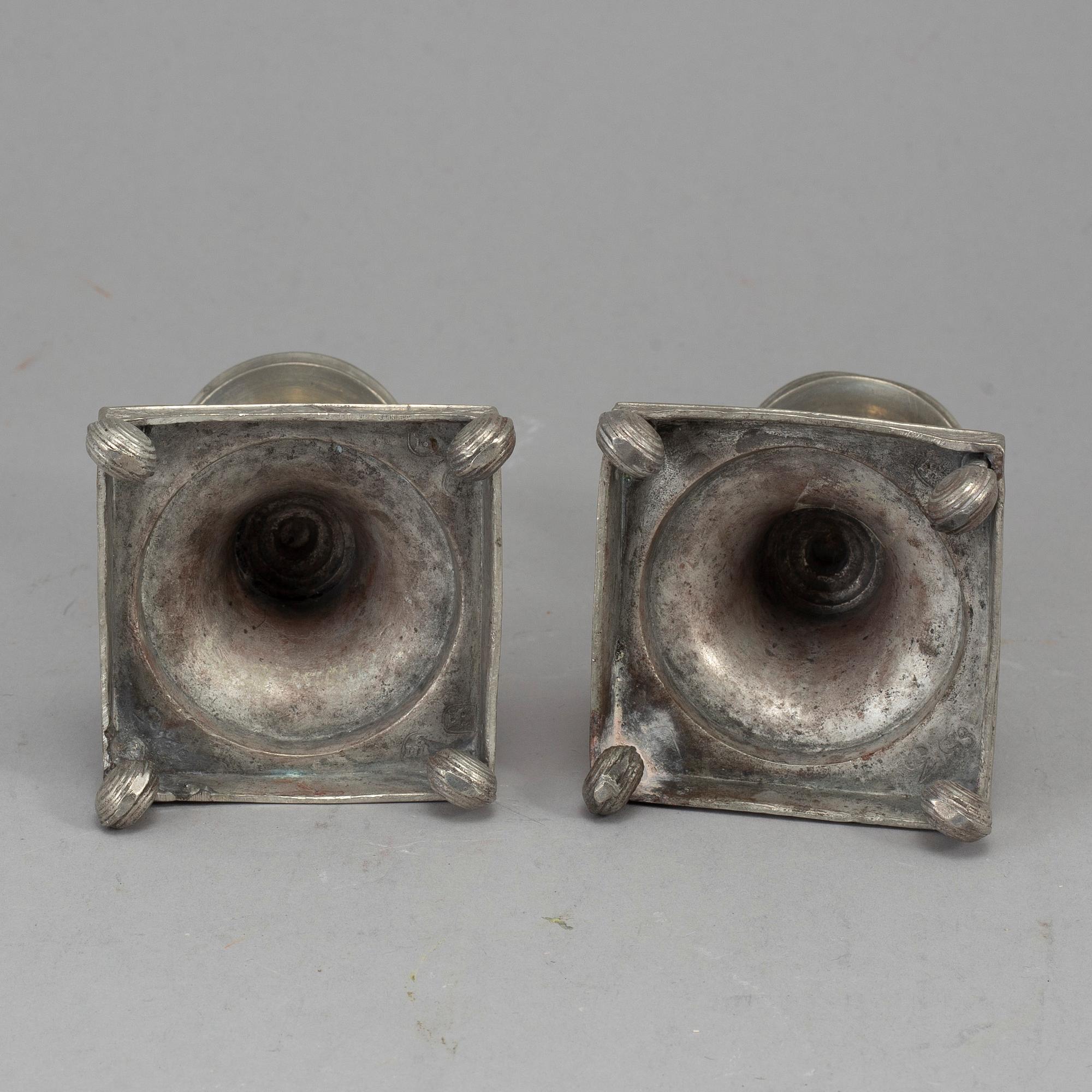 A pair of Swedish late gustavian pewter candlesticks, early 19th century.