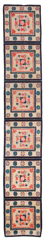 An antique Chinese meditation runner, late Qing dynasty, circa 1900. Measure approx. 357.5x60 cm.