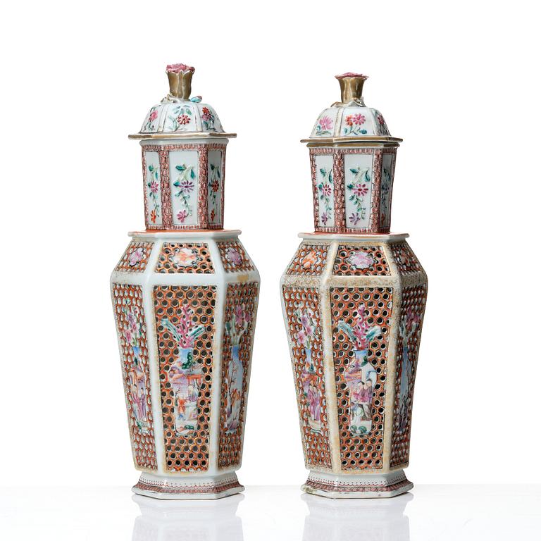 A pair of famille rose vases with covers, Qing dynasty, Qianlong (1736-95).