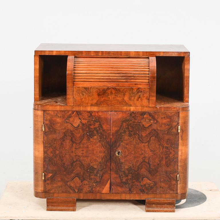 An Art Deco walnut cabinet/record player first half of the 20th century.