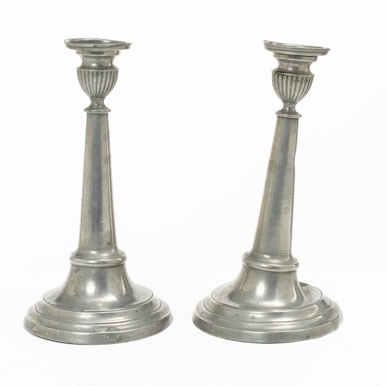 A pair of pewter candle sticks, Sweden, possibly 1844.