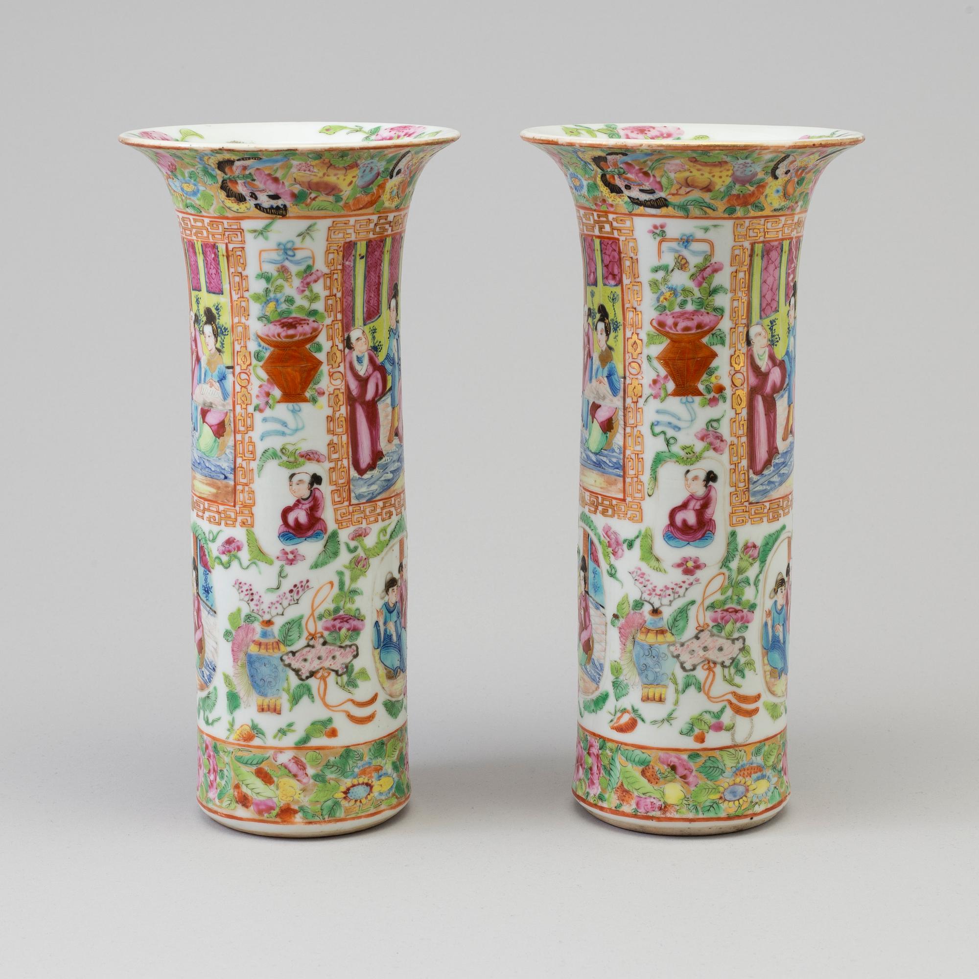 A pair of famille rose Canton porcelain vases, Qing dynasty, 19th century.