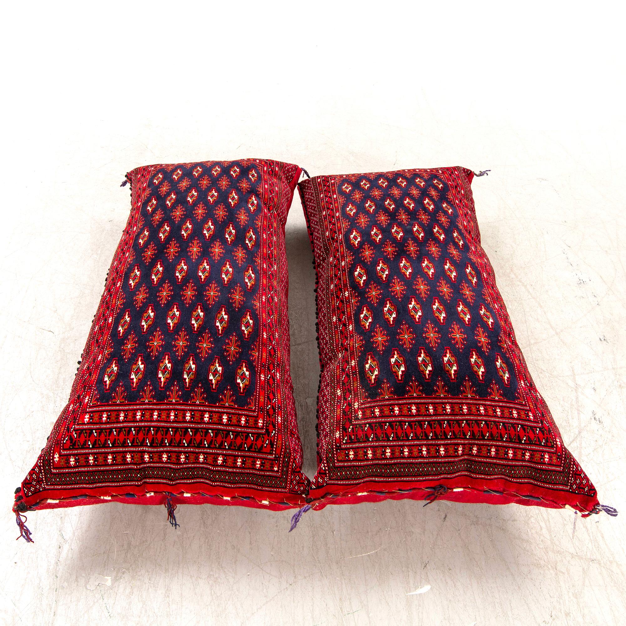 A pair of Tekke Turkmen cushions 125x58 cm each.