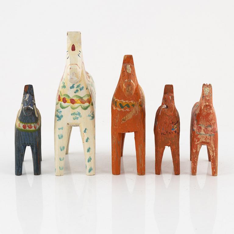 Five Swedish 'Dala' Horses, carved wood, 20th century.