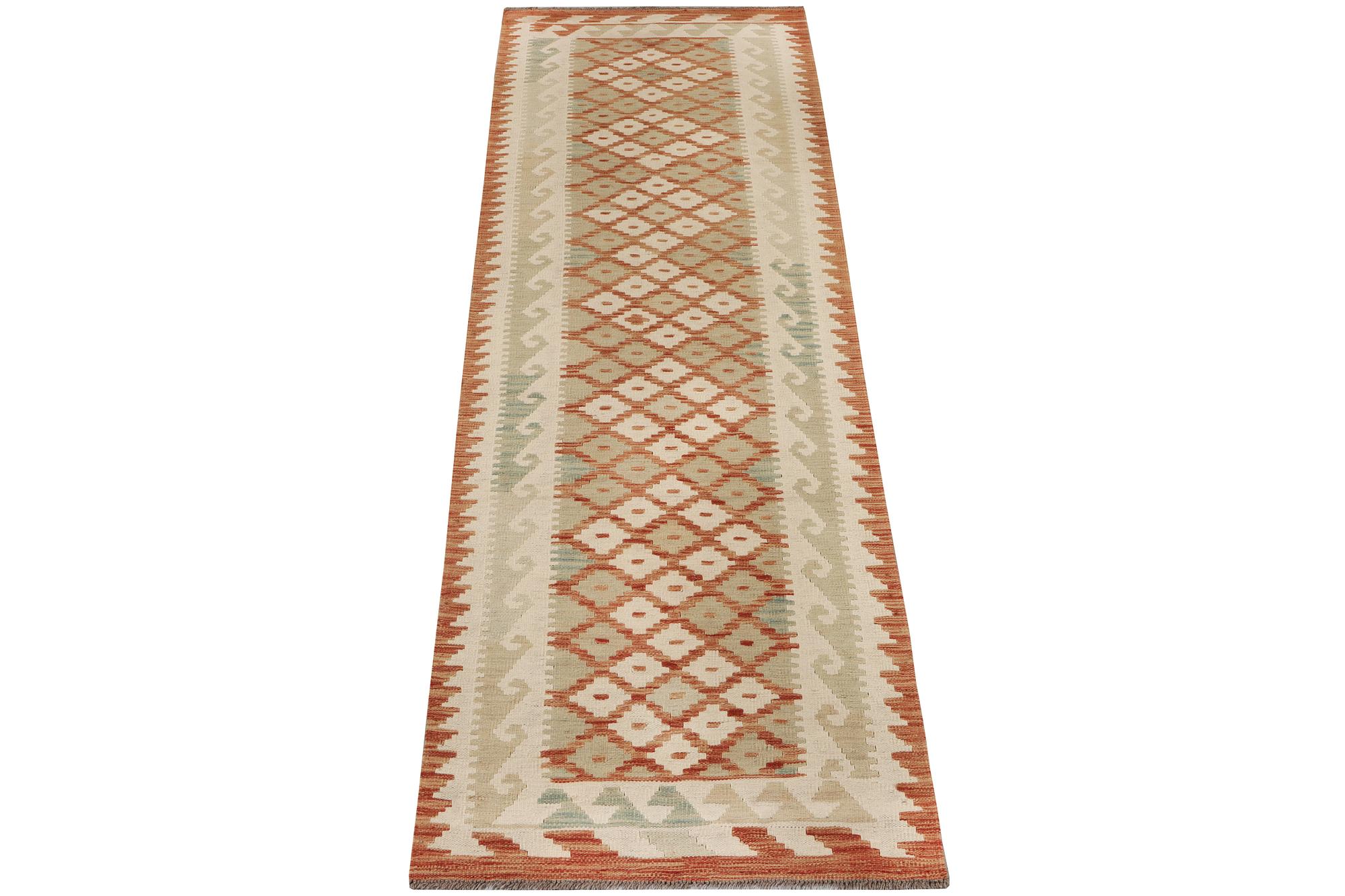 An Afghan kilim runner, c. 296 x 78 cm.