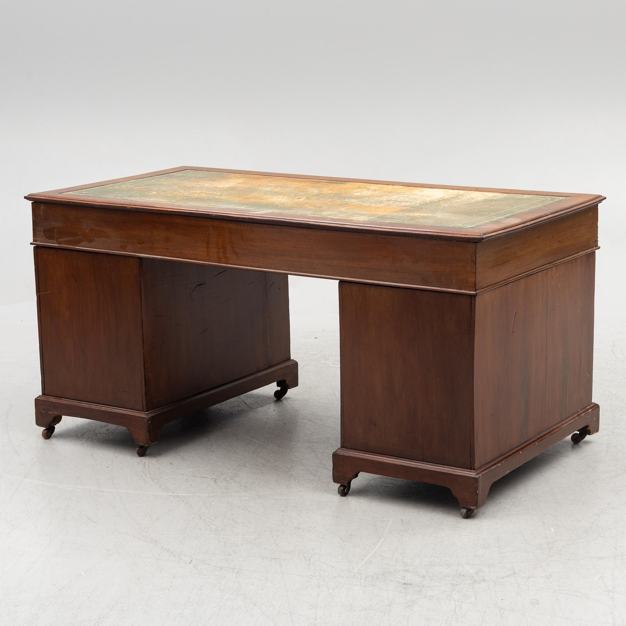 A 20th century writing desk, England.