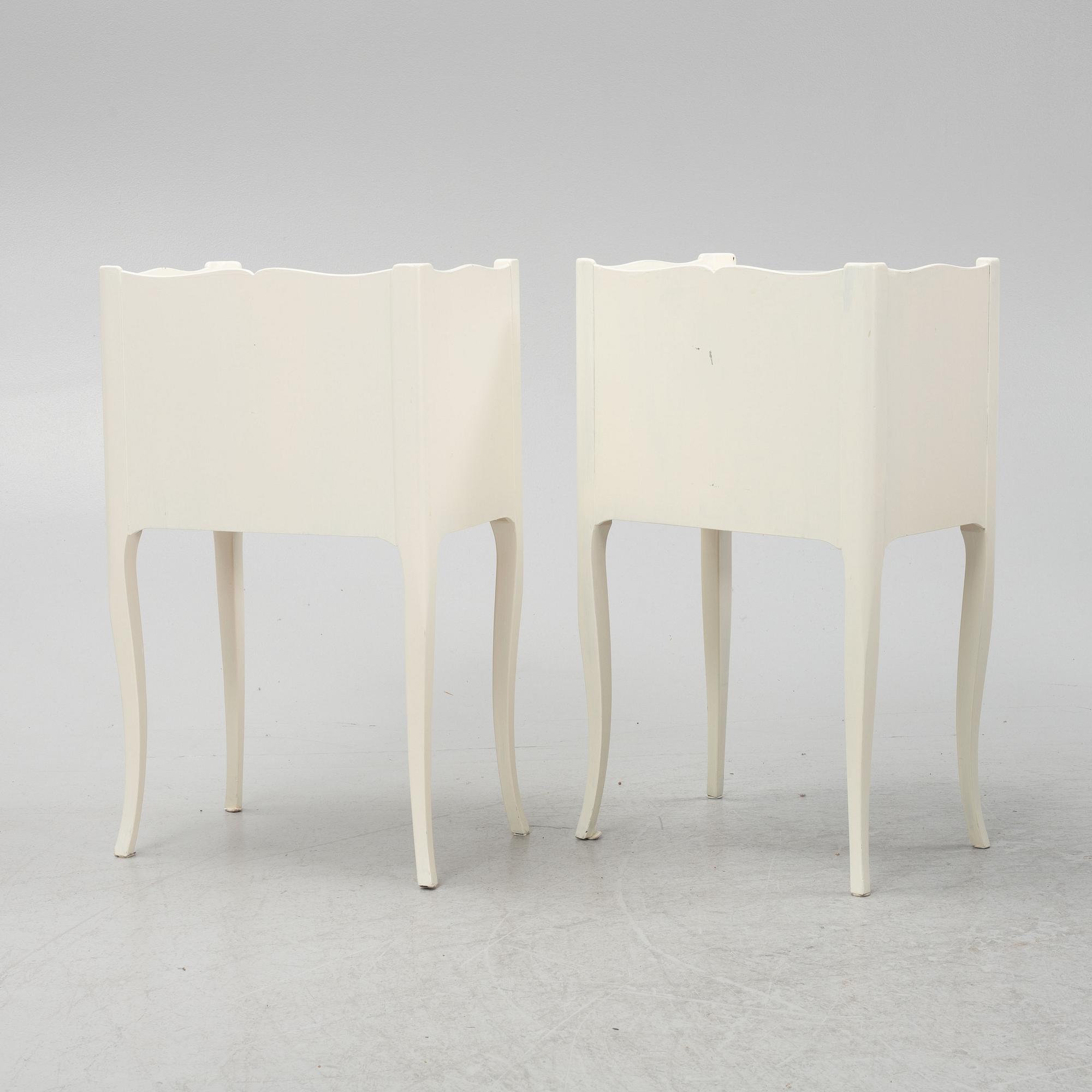 A pair of Rococo style bedside tables, mid 20th century.