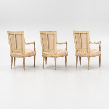 Three Louis XVI armchairs, France, late 18th century.
